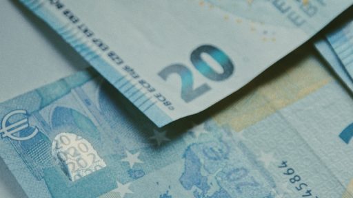 20 euro bill on white paper