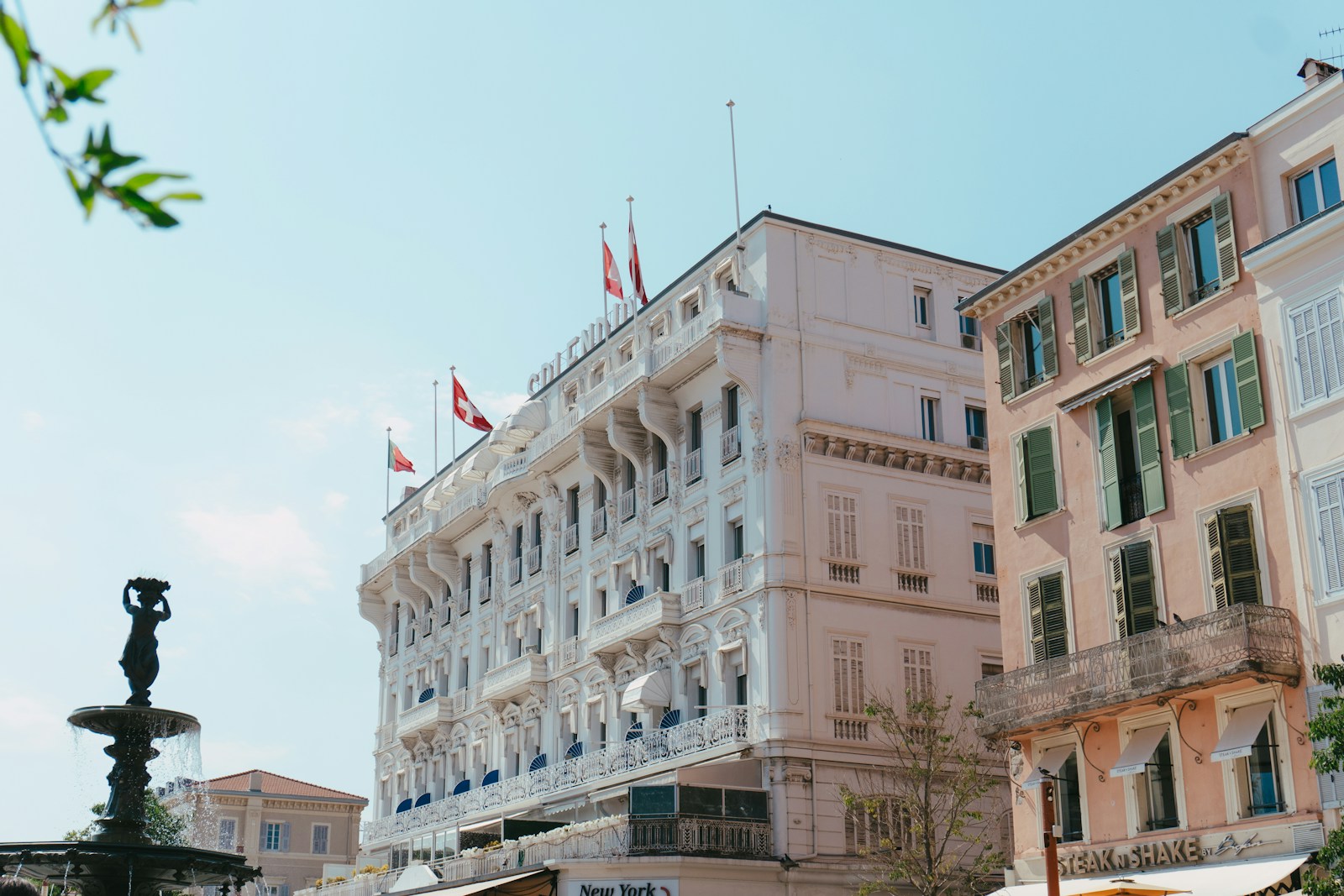 A historic building stands tall in the sunshine.